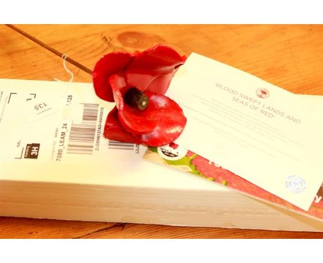 A Paul Cummins ceramic poppy, from the 'Blood Swept Lands and Seas of Red' installation at The Tower of London, with certific