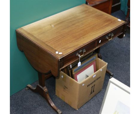 An Edwardian mahogany sofa table, the rectangular top and crown flaps with moulded edge over two frieze drawers opposed by fa