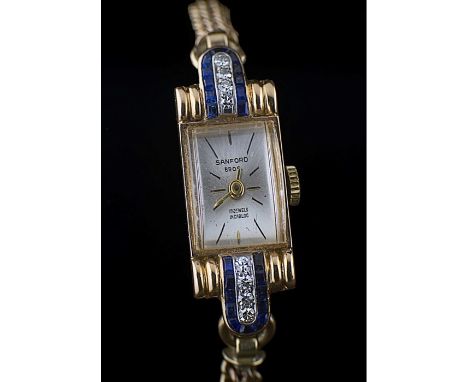 Patek Phillippe, a diamond set cocktail watch, the rectangular dial with champagne dial and baton numerals, signed Sandford B
