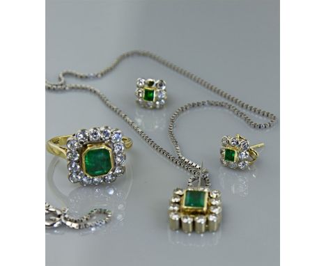 An emerald and diamond ring, pendant and earring suite, the ring with cut-cornered step cut emerald, within a border of brill