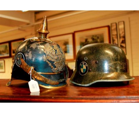 A German 'Coal scuttle-type' helmet, bearing 'BMW' and 'Luftschutz' decals