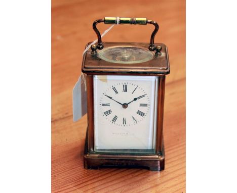 Mallett and Son, Bath, an early 20th century brass five glass carriage timepiece, the eight-day movement faced by enamel Roma
