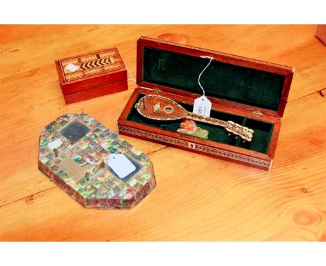 A miniature mandolin in a hardwood, bone and mother of pearl inlaid box, an abalone shell mounted ink stand presented by Domi