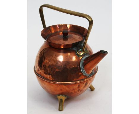 A copper and brass teapot designed by Christopher Dresser for Benham & Froud, impressed orb mark to base, height 23cm.