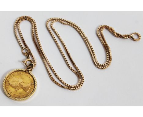 An Elizabeth II 1967 sovereign with hallmarked 9ct gold mount and chain marked '585', length 64cm, gross wt. 20.5g.
