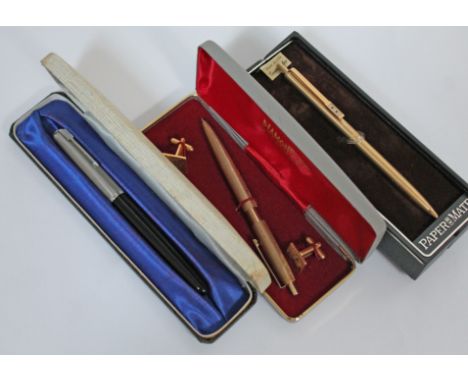 A vintage Parker fountain pen and two others.