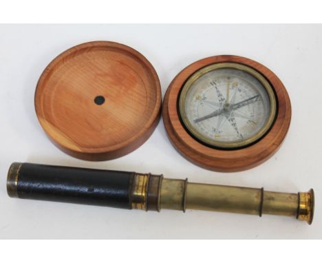 A Troughton & Simms brass compass in pear wood case, diam. 11cm, together with a three drawer telescope.