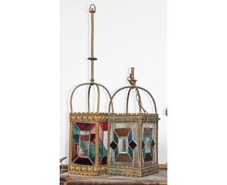 A matched pair of Victorian stained glass and brass hanging light fittings or lanterns.