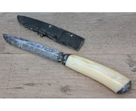 A Scandinavian knife with marine ivory handle, the blade inscribed 'Blikstad Trondhjem', with leather scabbard, length 24.5cm