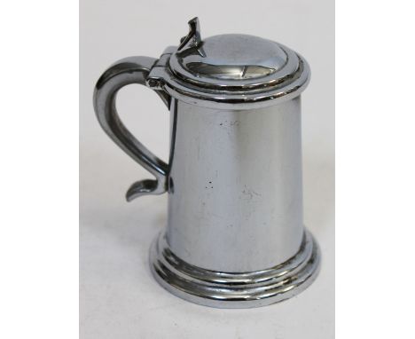 A Dunhill silver plated lighter in the form of a tankard, height 8cm.