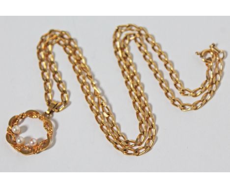 A hallmarked 9ct gold pendant and chain, the pendant set with three cultured pearls, pendant diam. 1.8cm, chain length 44cm, 