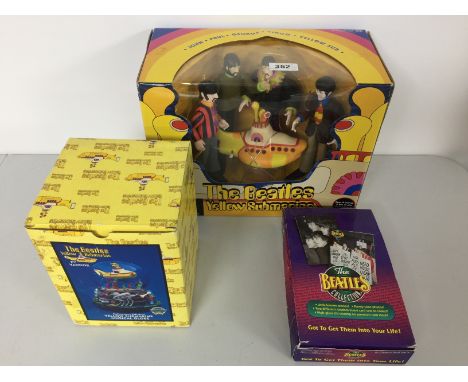 BEATLES - YELLOW SUBMARINE GLOBE/TOYS - Lot to contain three collectible Beatles items. There's a collector edition Yellow Su