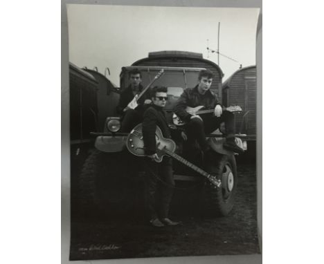 ASTRID KIRCHHERR SIGNED BEATLES - A super lithograph print of the Astrid Kirchherr shot of Stuart Sutcliffe, John and George 