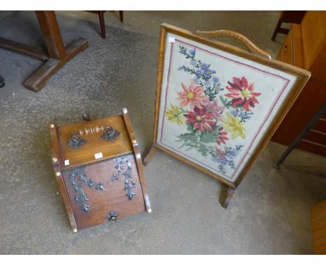 A Victorian oak coal scuttle and fire screen