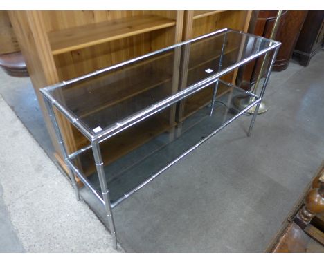 A chrome bamboo effect two tier console table