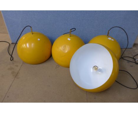 A set of four 1970's ceiling light shades
