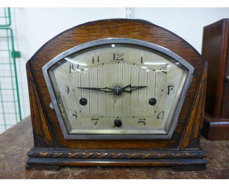An oak mantel clock