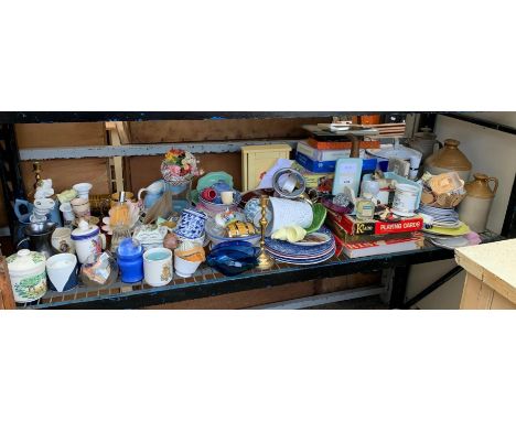 SHELF OF ORNAMENTS, EARTHENWARE FLAGGONS, ENAMEL BREAD BIN, PLATES ETC