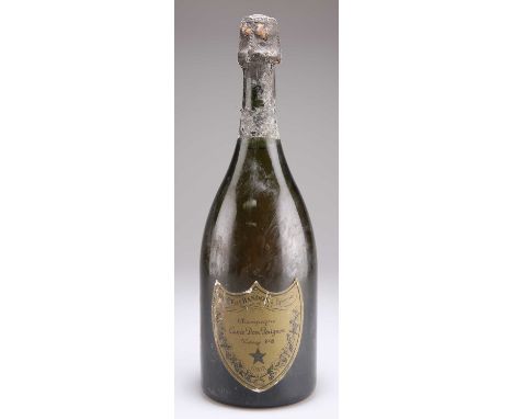 A BOTTLE OF CHAMPAGNE ‘DOM PERIGNON’ VINTAGE 1988 level at 1cm inverted, some minor cellar damage to label and capsule, no ev