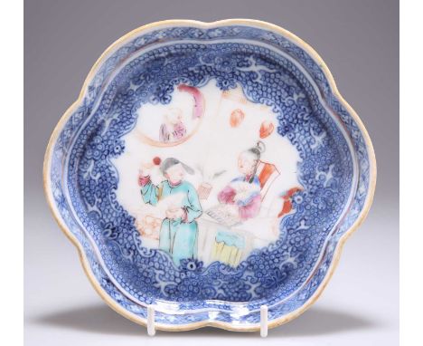 A CHINESE EXPORT LOBED TEAPOT STAND, 18TH CENTURY decorated with figures in a Famille Rose palette. 16.5cm diameterGeneral fa