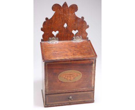 A GEORGE III MAHOGANY CANDLE BOX the lidded compartment above a single drawer, decorated with a shell motif and string inlay,