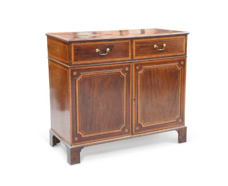 A GEORGE III MAHOGANY AND SATINWOOD BANDED CLOTHES PRESS the rectangular top above a pair of drawers over a pair of panelled 