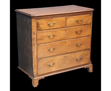 A GEORGE III MAHOGANY AND ELM CHEST OF DRAWERS with two short over three long graduated drawers, raised on bracket feet. 98cm
