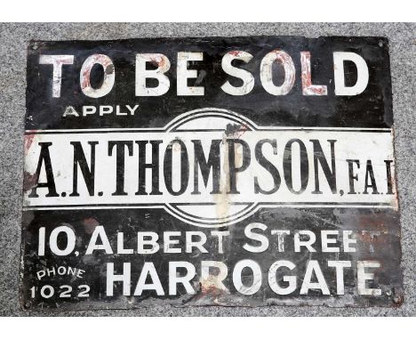 AN ENAMEL SIGN for A.N. Thompson, Harrogate. 38cm high, 50.5cm wide
