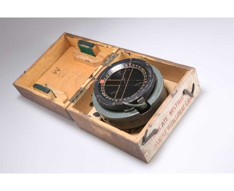 AN AIR MINISTRY TYPE P.8 COMPASS no. 132865B, in a wooden case with examination stamps. Compass 14cm diameter overall
