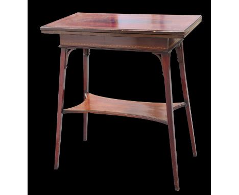 AN EDWARDIAN INLAID MAHOGANY FOLDOVER CARD TABLE raised on splayed square-section legs joined by a shelf stretcher. 72.5cm hi