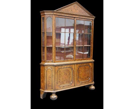 A DUTCH FLORAL MARQUETRY VITRINE, 19TH CENTURY with a pair of glazed doors above a pair of cupboard doors, raised on bun feet