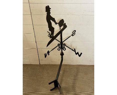 A rustic weather vane 