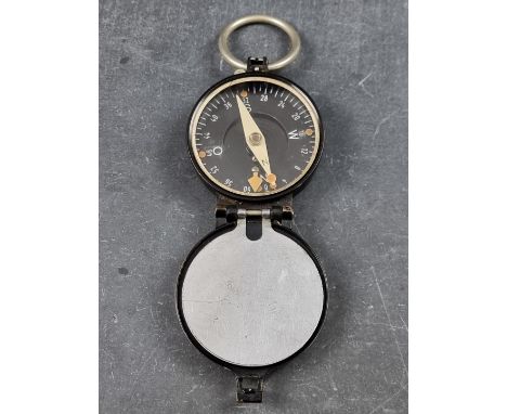 A WWII German Wehrmacht marching compass, by Busch, Serial No.78645, 54mm. 