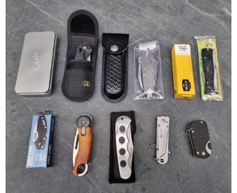A British Army knife;&nbsp;together with ten other folding knives. (11)