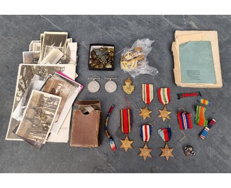 An interesting group of British Army and Navy related militaria, to include: postcards, photographs, medals and similar. 