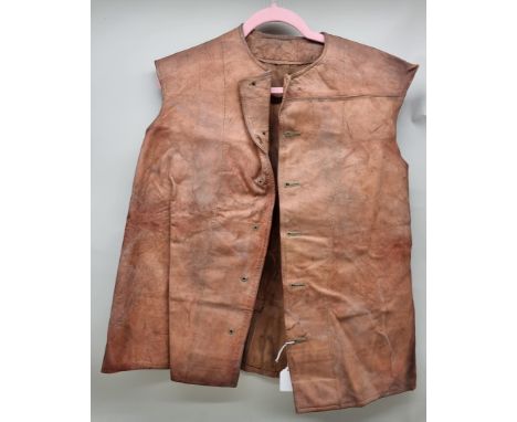A vintage tan leather jerkin. 