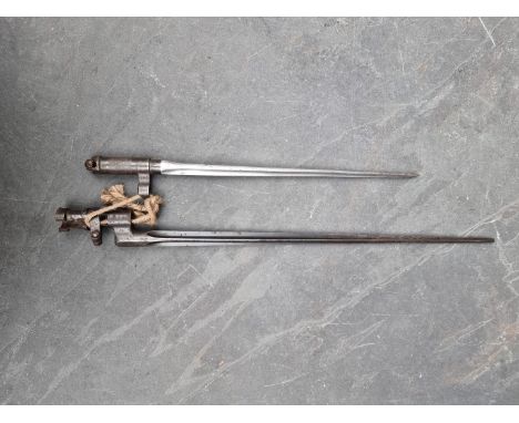A vintage Russian bayonet; together with a vintage Chinese bayonet. (2)