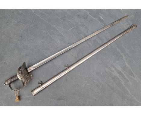 An Edwardian 1897 pattern infantry officer's sword and steel scabbard, with 82cm etched blade.