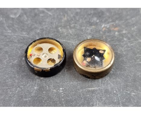 Two incomplete WWII British 'Escape and Evasion' compasses, comprising a 'pill box' and a tunic button examples. 