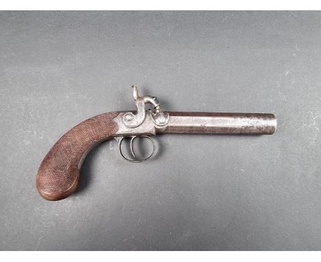 A 19th century percussion travelling or overcoat pistol, with 4in half octagonal barrel and engraved action.