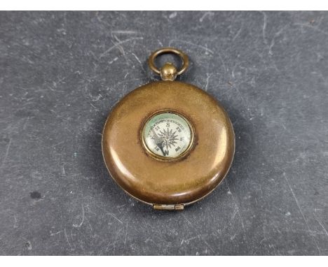 An early 20th century novelty collapsible stirrup cup in case with compass, by C T &amp; S, 4.5cm diameter. 