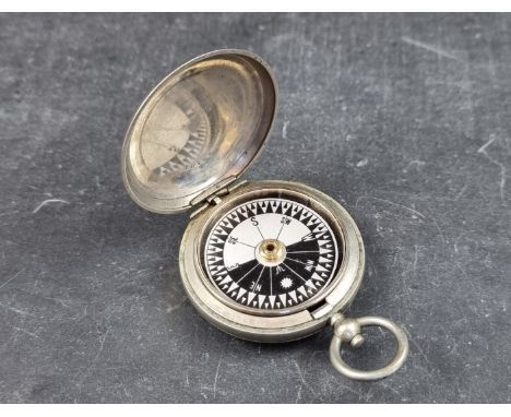 A WWI British military Mk.V nickel plated pocket compass, by Dennison, Birmingham, dated 1916. 