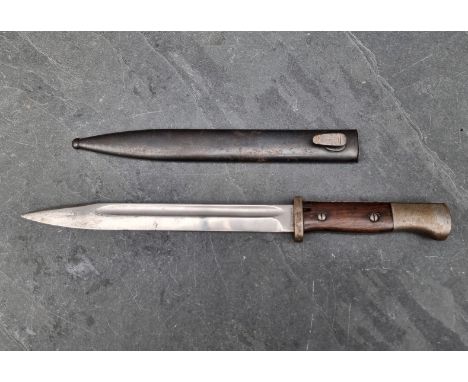 A German WWII Mauser bayonet by F Herderer, stamped '38' and No.8920; together with scabbard by F W Holler, stamped '1939' an