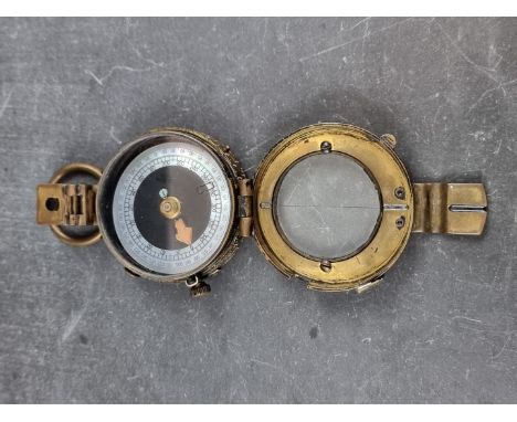 A WWII Australian military Mk.IX compass, by J.W. Handley, Melbourne, dated 1941,&nbsp;with broad arrow mark. 