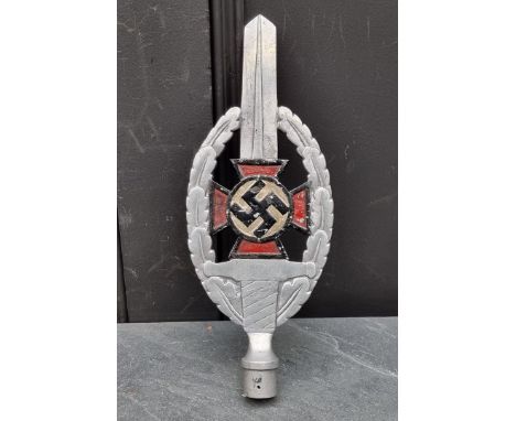 A German Third Reich N.S.D.A.P painted aluminium flag finial,&nbsp;33cm high. 