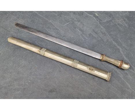 A Tibetan dpa'dam long sword and scabbard, with traditionally made 68cm blade, wire grip and plated pommel.