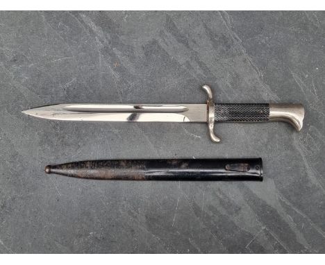 A German WWII fire police dress bayonet and scabbard, distributed by Linnenbrugger &amp; Ellerman of Bielefeld, having 15cm b