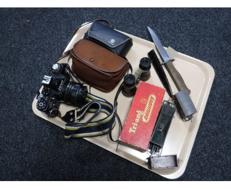 A tray of boxed Triang Railways engine, three carriages, pair of field glasses, Zenit camera, two further cameras and a knife