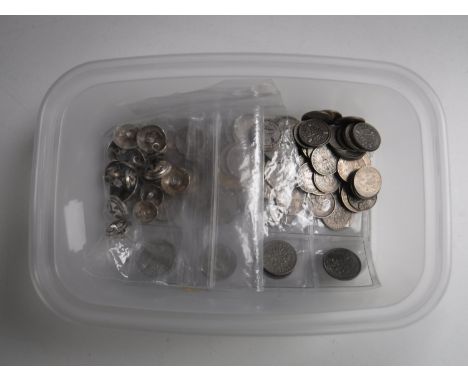 A tub of silver six pence's and three penny pieces, bag of vintage and enamelled buttons 