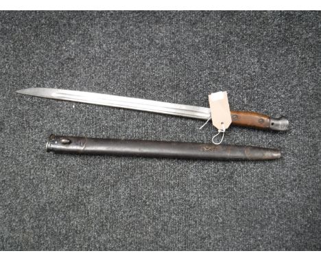 A 1907 pattern Wilkinson bayonet in scabbard 